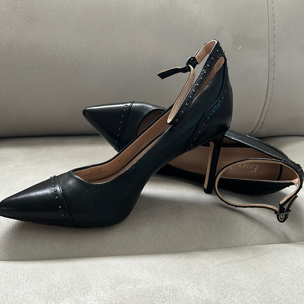 Great condition worn once inside black leather shoe with sexy studded detail